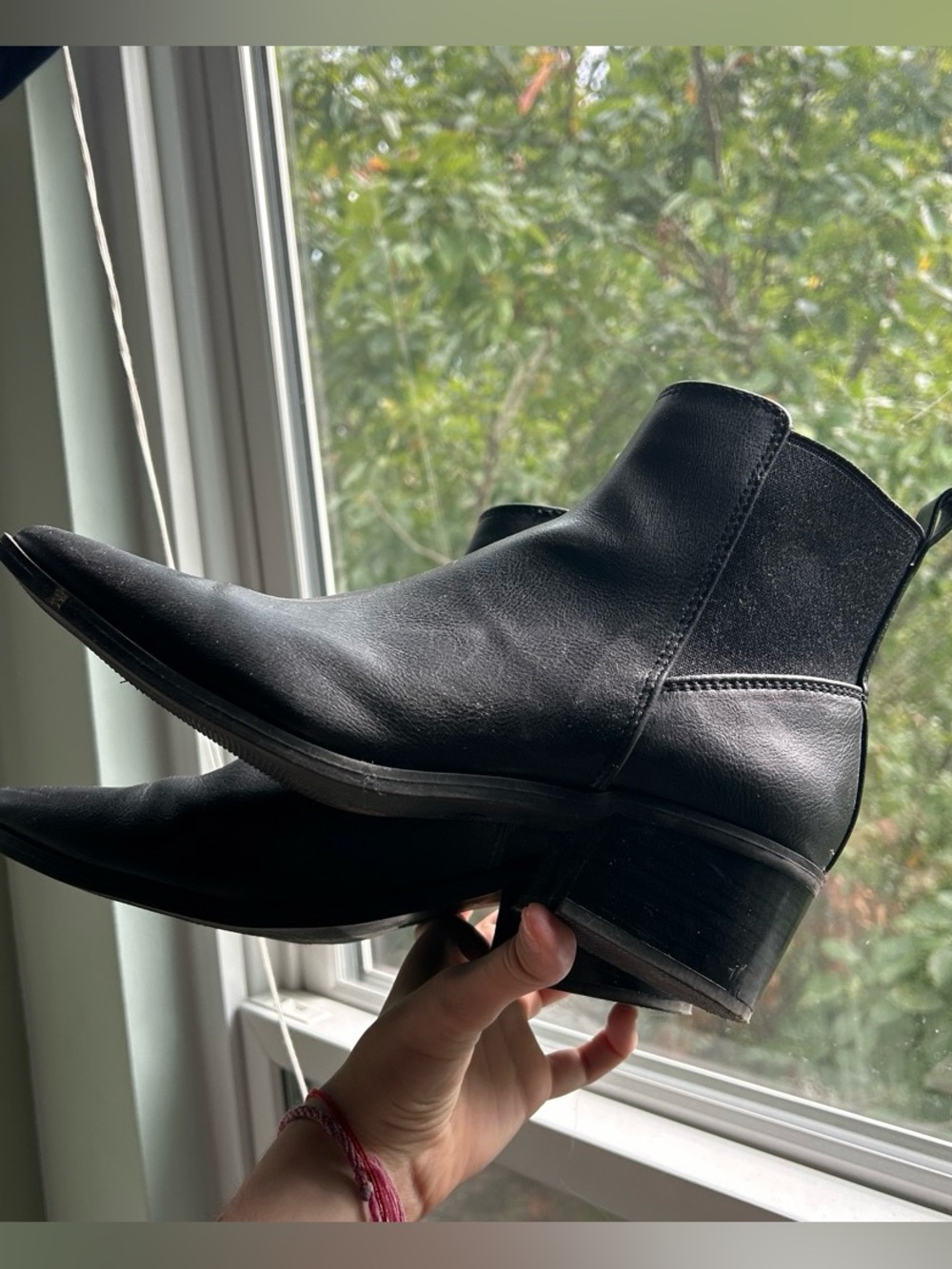 Black leather ankle boots with pointed toe and block heel